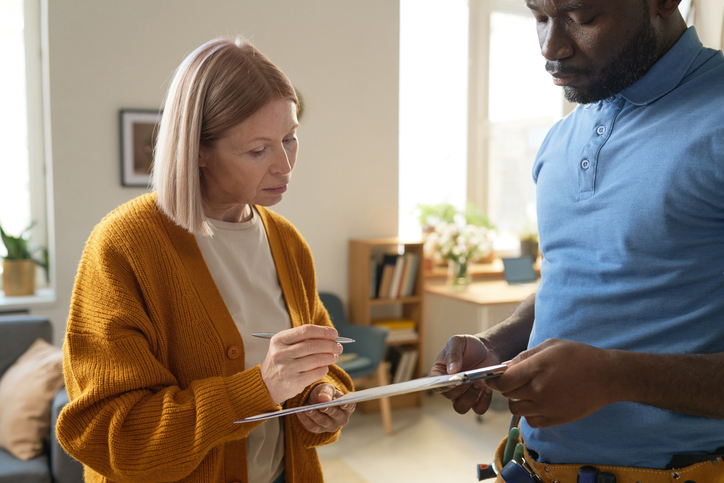 Blonde Woman Signing Agreement For Services
